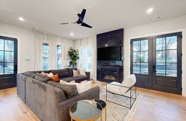 Luxurious all-new townhome with fireplace, home office, central AC, & W/D
