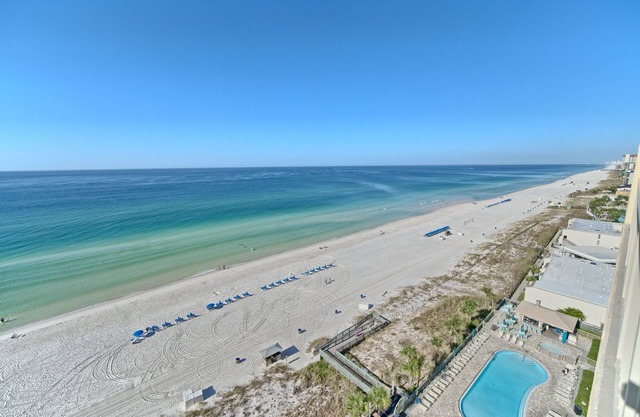 Luxurious Beachfront Condo with Beachside Pool Access and Free WiFi - Unit 1202 by RedAwning