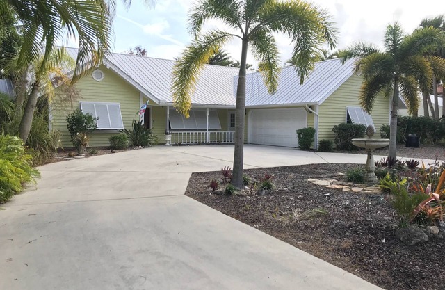 Luxurious Waterfront Home, ocean access, dock, pool, and spa