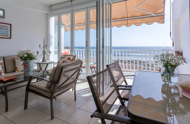 Luxury apartment in front of the beach.