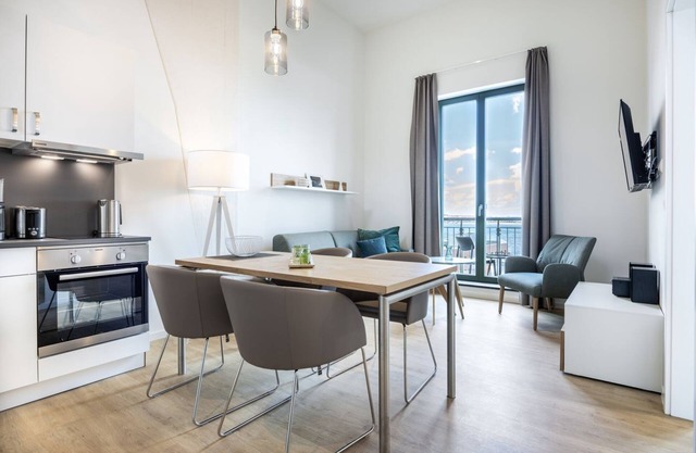 Luxury apartment with gallery bedroom, roof terrace and unique harbor view!