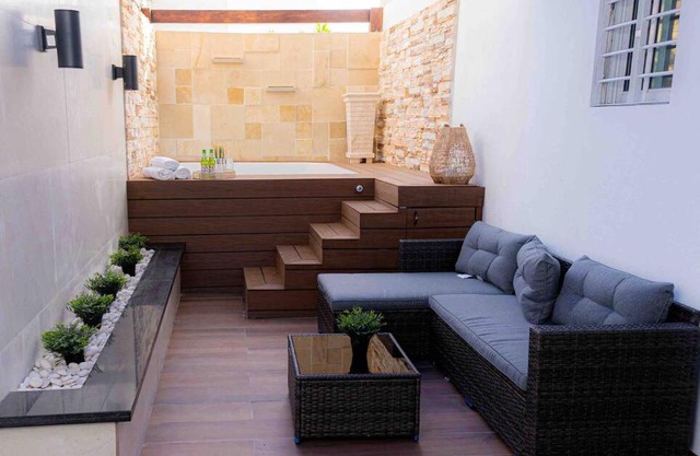 Luxury stay with terrace and private jacuzzi.