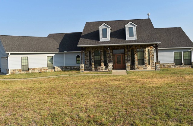 Luxury Home in Peaceful Country! 4 Bed 3.5 Bath, complete w view of stocked Pond