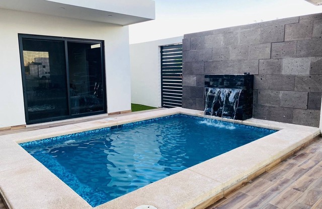 Luxury minimalist 3-bedroom house welcoming you with a private pool.