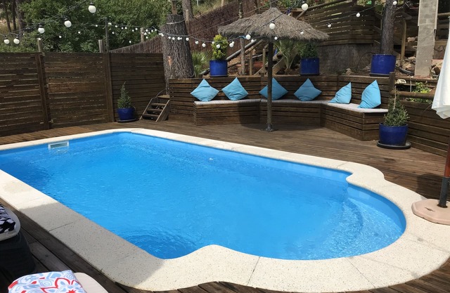 Luxury, self contained, airconditioned studio with private terrace & use of pool
