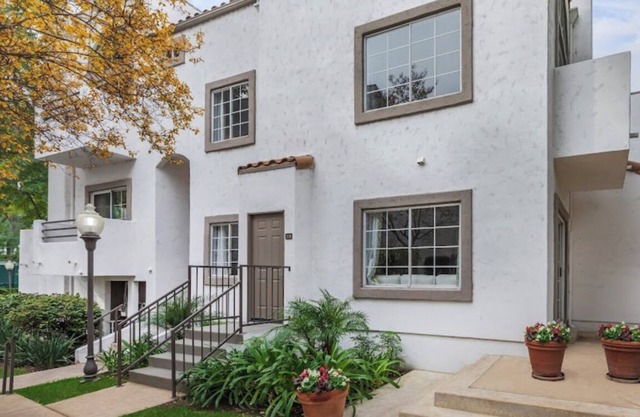 Luxury townhome in gated community with private garage