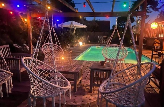 Maison bois bassin d'arcachon piscine jacuzzi 8 people