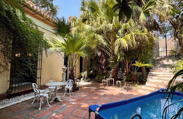 Manor house with large tropical garden, swimming pool and spectacular views.