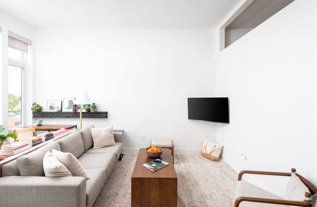 Modern 1BR Apt with Skywalk to Fiserv, Rooftop, and Parking