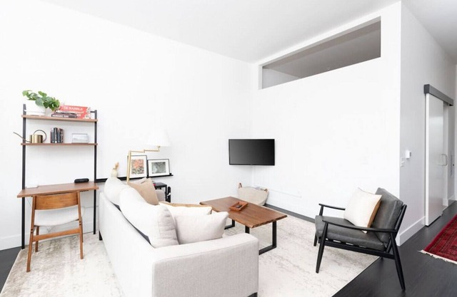 Modern 1BR Apt with Skywalk to Fiserv, Rooftop, and Parking