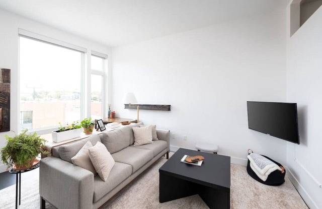 Modern 1BR Apt with Skywalk to Fiserv, Rooftop, and Parking