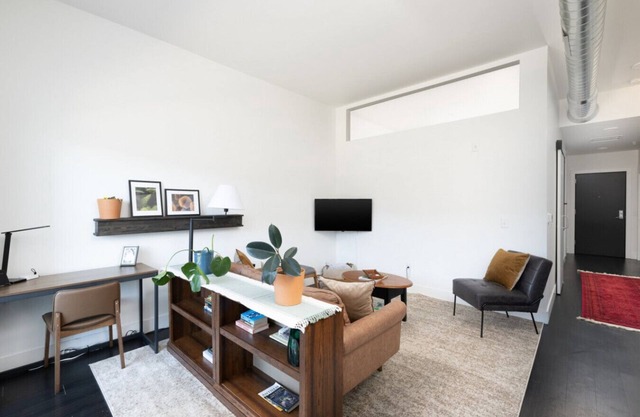 Modern 1BR Apt with Skywalk to Fiserv, Rooftop, and Parking