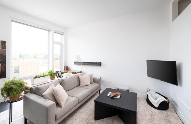Modern 1BR Apt with Skywalk to Fiserv, Rooftop, and Parking