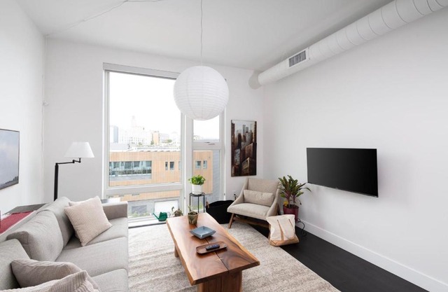 Modern 1BR Apt with Skywalk to Fiserv, Rooftop, and Parking