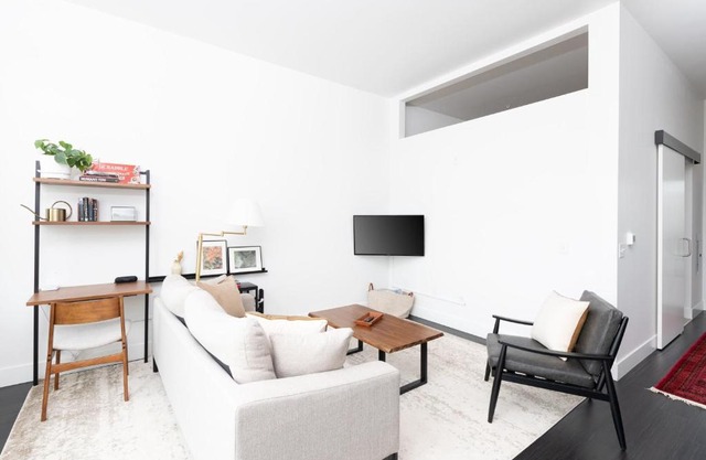 Modern 1BR Apt with Skywalk to Fiserv, Rooftop, and Parking