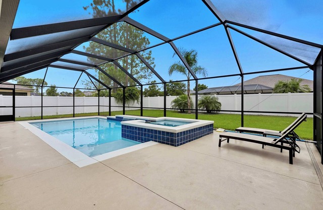 Modern 4BR Retreat Near Beach + Heated Pool