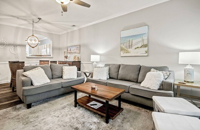 Modern condo across from pool, near beach and on 9th hole of Norman golf course!