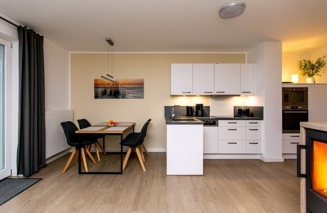 Modern, cozy 2-room apartment with wood-burning stove and lake view House 7 No 85