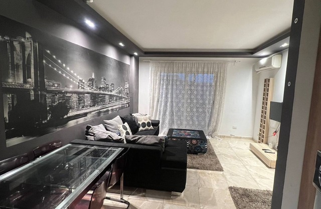 Modern cozy apartment close to the airport in a worldclass compound, has balcony