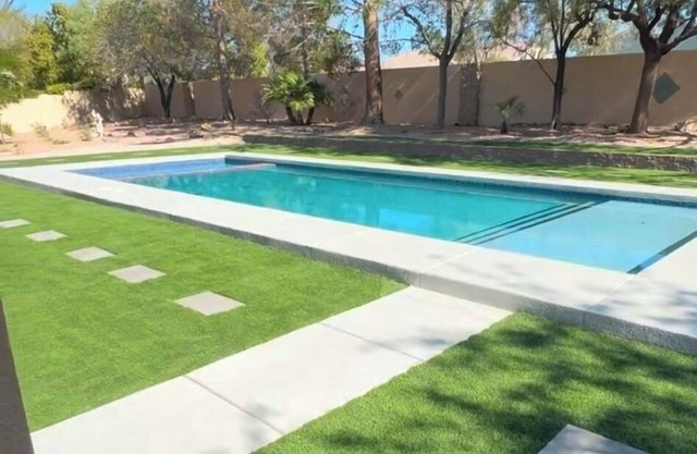 Modern home 12 min from strip, Swimming pool , , enclosed yard, backyard oasis