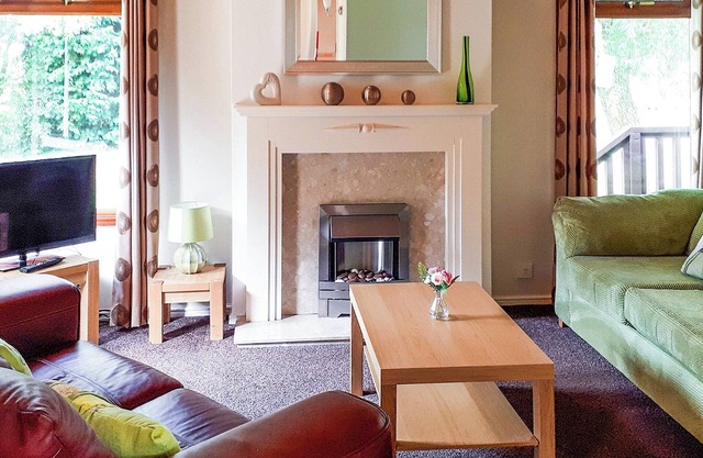 Modern two bedroom lodge, one double and one twin with en suite shower.