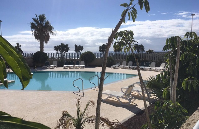 Modern two floor apartment right by the beach with pool, patio and paddle court