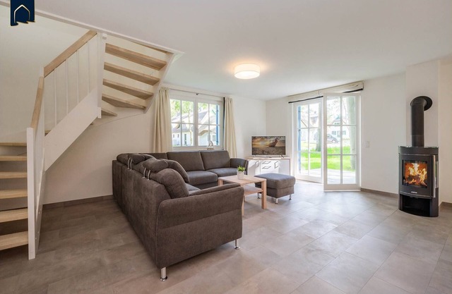 Modern vacation home in the fishing village with sauna & fireplace - in the middle of nature, close to
