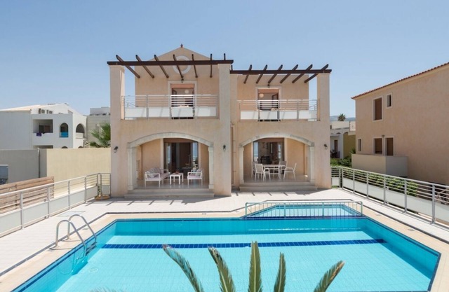 Modern Villa with Private Pool and Amazing Sea Views and just 100 meters to the Beach !