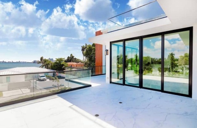 Modern Waterfront Villa w/Pool, Rooftop & dock