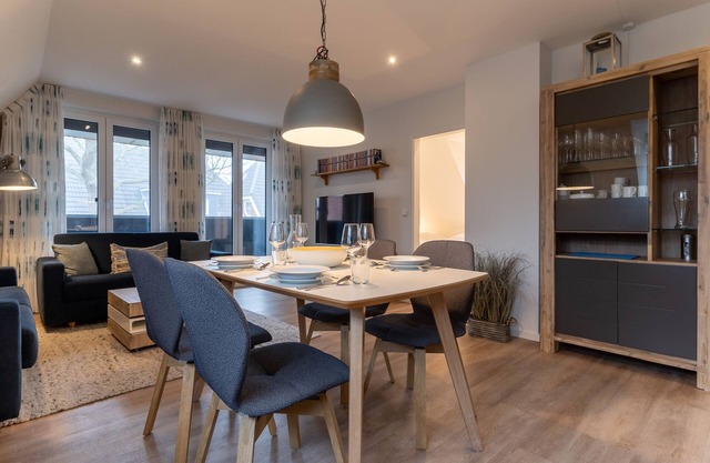 Moments of happiness upstairs - modern apartment in the heart of the village