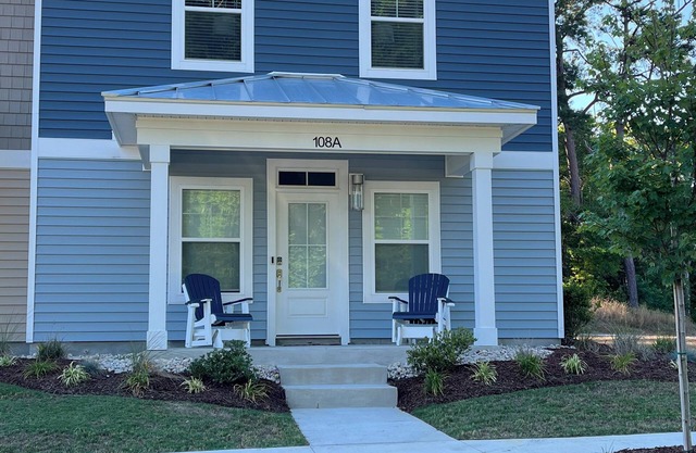 New 3-bedroom townhome near OBX beaches with a community pool . Outside lounge