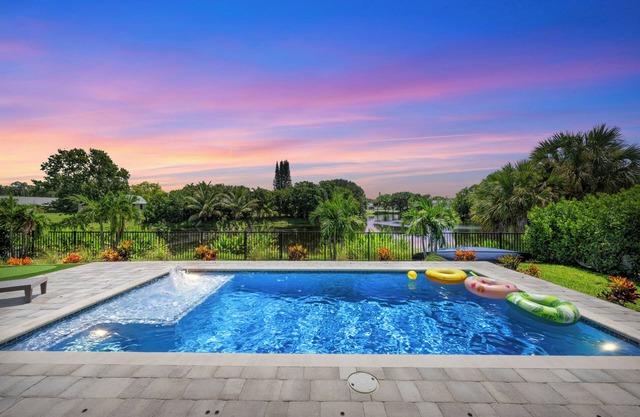 New Construction Lakefront Home with Mini Golf Course, Heated Saltwater Pool!