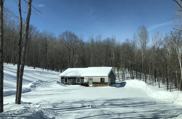 New Home in the woods with direct access to trails!