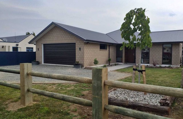 New, large, family friendly home, great location, walk to town,