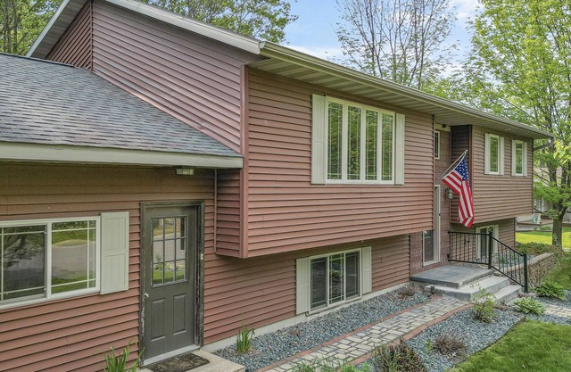 New Listing! Spacious home with wooded back yard!