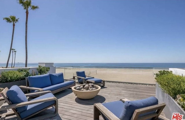 New modern beach front home with gorgeous rooftop deck!