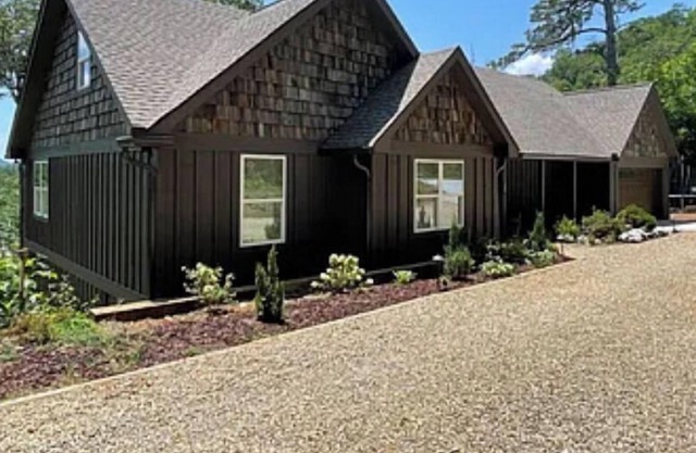 New Mountain Modern Board and Batten 4 bedroom/ 3 Full bathroom Family Home