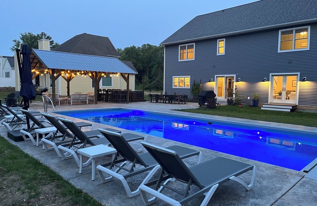 New South Haven Getaway with large 16 by 40 salt water inground pool and hot tub