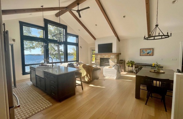 New, stunning modern lake home with private swimming beach and dock