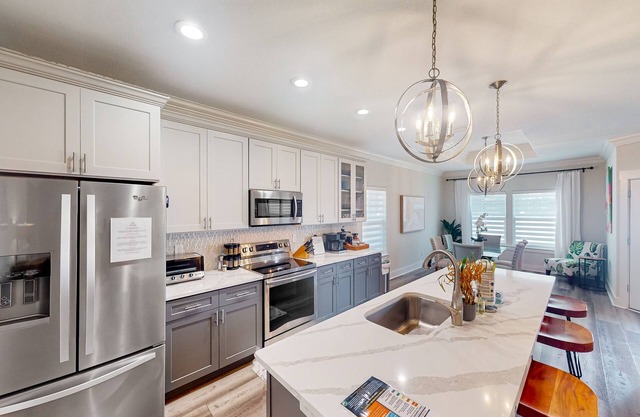 Newer home with elegant interior & fenced yard, 3 blocks to the beach