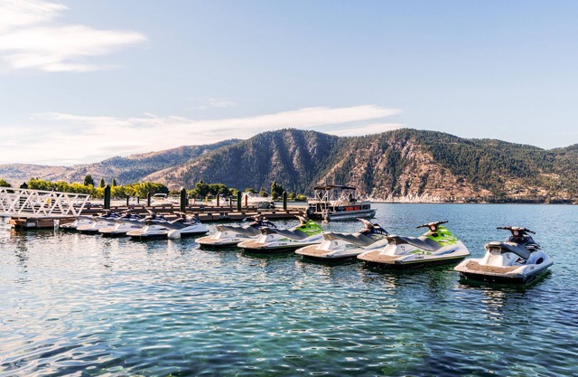 Newly constructed lakefront home w/private pool, boat dock, & wrap-around deck