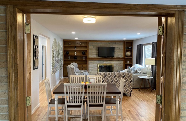 Newly Remodeled Brick Home with wall Sculptures by the Airport