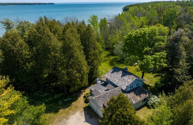 Newly renovated with over 250 feet of Shoreline!