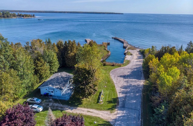 Newly updated Lake Michigan Waterfront with pier for boats! Room for trailer!