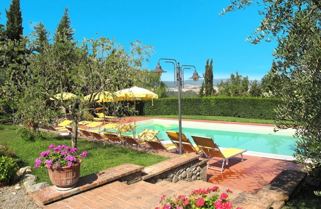 Nice apartment in villa for 2 guests with WIFI, pool, TV, patio and parking