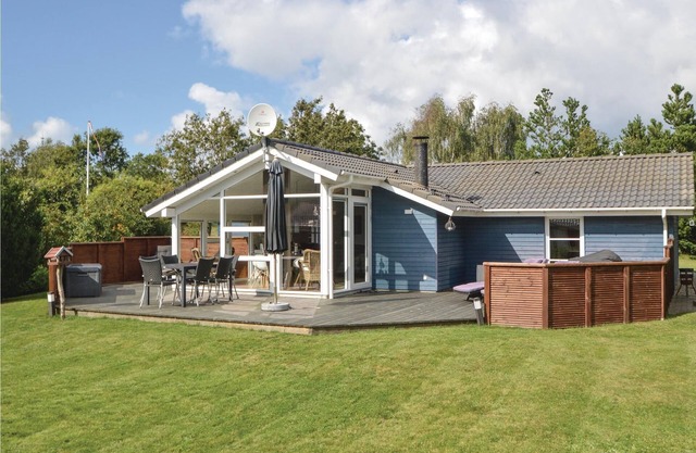 Nice cottage with carport on undisturbed lawned property.