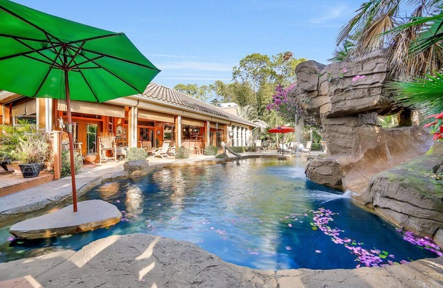 Oasis Resort-resort Spa/pool With Slide, Large Tiki Huts, And Garden Paths. Ahh!