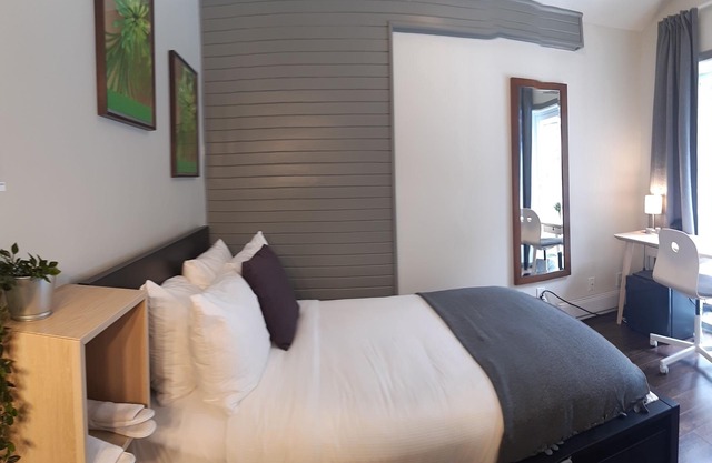 Oberge Inn Riverside guest room in Val-David village with free parking
