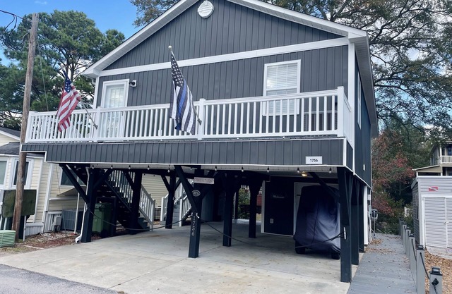 Ocean Lakes -Site 1756 Outdoor seating area w/firepit. Serene canal views!
