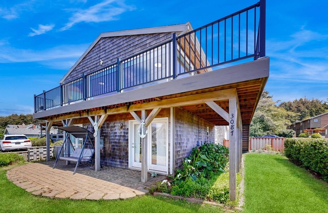 Ocean-view home - dog-friendly, private W/D, four fireplaces - steps to beach